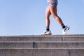 legs of an african american woman running outdoors Royalty Free Stock Photo