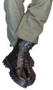 Legs in army khaki pants and military boots Royalty Free Stock Photo