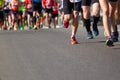 Legs of athletes running half marathon in Kyiv Royalty Free Stock Photo