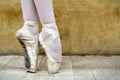 Legs of a ballerina in pointe shoes. Copy space.