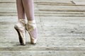 Legs of a ballerina in pointe shoes. Copy space.