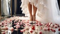 Legs of bride in beautiful shoes, married , flower petals accessory