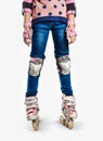 Legs of a child on roller skates. Royalty Free Stock Photo