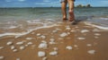 Legs of child on the sand beach, nice tropical view. Generative AI