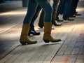 Legs close up of line dance traditional western folk music dancers Royalty Free Stock Photo