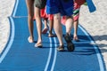 Legs and feet of a family walking Royalty Free Stock Photo