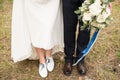 Legs and feet of married couple in stylish shoes Royalty Free Stock Photo