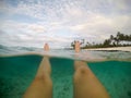 Legs and feet POV - split point of view of female floating in cl