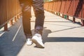 The Legs and feet,woman walking on bridge relax on tour Royalty Free Stock Photo