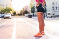 legs of a female athlete in sportswear at the city Royalty Free Stock Photo