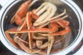 Legs of fresh red Kamchatka crab or king crab in a pot of water