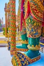 The legs of the giant Guardian Yaksha decorated with floral elements, Grand Palace, on May 12 in Bangkok, Thailand