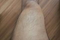 Legs hair of asian man close up