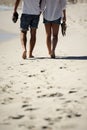 Legs, holding hands and couple on beach for date, outdoor bonding love and tropical holiday. Romance, man and woman from Royalty Free Stock Photo