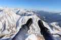 Legs kept parallel while paragliding on snow mountains Royalty Free Stock Photo