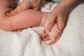 Legs of little child with red rash, closeup. Concept of babies allergies Royalty Free Stock Photo