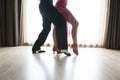 Legs of male and female latin salsa dancers