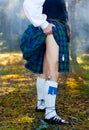 Legs of the man in kilt Royalty Free Stock Photo