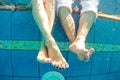 Legs of man and woman in the pool underwater Royalty Free Stock Photo