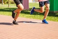 Legs of men running in a sports competition