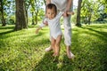 Legs of mother and baby. First steps Royalty Free Stock Photo