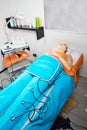 Legs pressotherapy machine on woman in beauty center