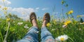 Legs of relaxing girl lying on the spring blooming meadow Royalty Free Stock Photo