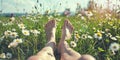 Legs of relaxing girl lying on the spring blooming meadow Royalty Free Stock Photo