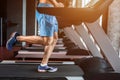 Legs running on the treadmill close up