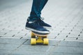 Woman skateboarding on ctiy street Royalty Free Stock Photo