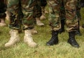 legs of soldiers in black and white shoes. military concept. troops, army, military men Royalty Free Stock Photo