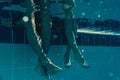 Legs in swimming pool Royalty Free Stock Photo