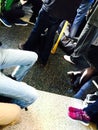 Legs on a train Royalty Free Stock Photo