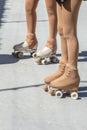 Legs of skaters on a track