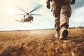legs of soldier walking through battle field with chopper in background , AI Generated Royalty Free Stock Photo