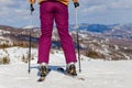 Legs and view from behind the skier on the mountain Royalty Free Stock Photo