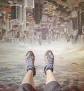 Legs of a woman in sneakers relaxing in sky. Royalty Free Stock Photo