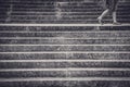 Legs of a woman walking between concrete stairs Royalty Free Stock Photo