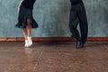 Legs of young couple boy and girl dancing in ballroom dance Jive Royalty Free Stock Photo