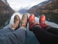 Legs of a young couple near the lake Royalty Free Stock Photo