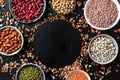 Legumes assortment, shot from the top on a black background Royalty Free Stock Photo
