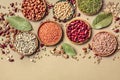 Legumes assortment, shot from the top on a rustic brown background Royalty Free Stock Photo