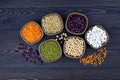 Legumes and beans assortment in bowls: lentils, beans, mung and chickpeas