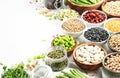 Legumes and beans. Dried, raw and fresh. Lentils, chickpeas, mung beans, soybeans, edamame, peas in glass jars. Healthy diet food Royalty Free Stock Photo