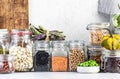 Legumes and beans set in jars. Dried, raw and fresh. Lentils, chickpeas, mung beans, soybeans, edamame, peas. Healthy diet food, Royalty Free Stock Photo