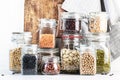 Legumes and beans set in jars. Dried, raw Lentils, chickpeas, mung beans, soybeans, edamame, peas. Healthy diet food, vegan Royalty Free Stock Photo