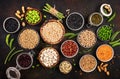 Legumes, beans and sprouts. Dried, raw and fresh, top view. Red kidney beans, lentils, mung beans, chickpeas, soybeans, edamame,