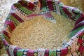 Legumes in colorful patterned fabric sack