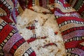 Legumes in colorful patterned fabric sack