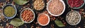 Legumes flat lay panorama, shot from the above on a black background. Lentils, soybeans, chickpeas, red kidney beans